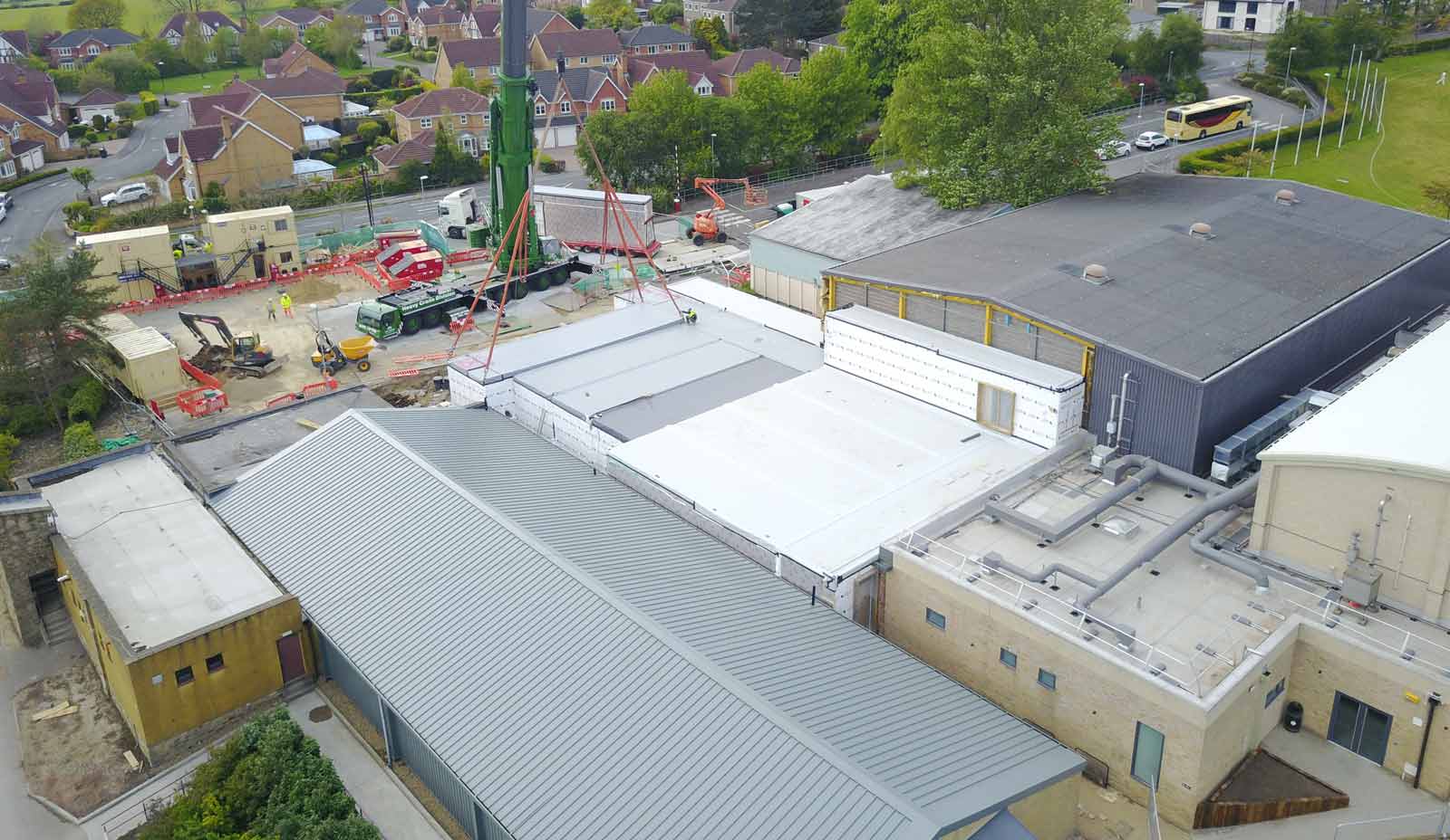 Drop In Session! One of the final pods – manufactured off-site in Newark – is lowered into place at Ashville Sports Centre