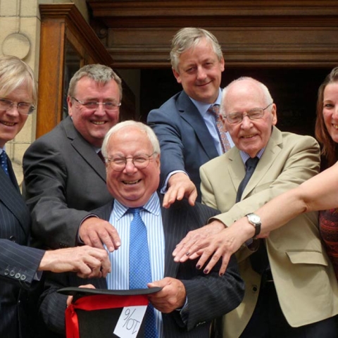 The luckiest dip of all! The previous Mayor of the Borough of Harrogate, Coun Nick Brown, centre, invites the recipients of the funds raised at his Magical Spring Ball to take their cheques for £26,200 from the Mad Hatter’s hat. From left are Sir Andrew Lawson-Tancred, Tony Collins, Michael Furse, Peter Thompson and Liz Hancock