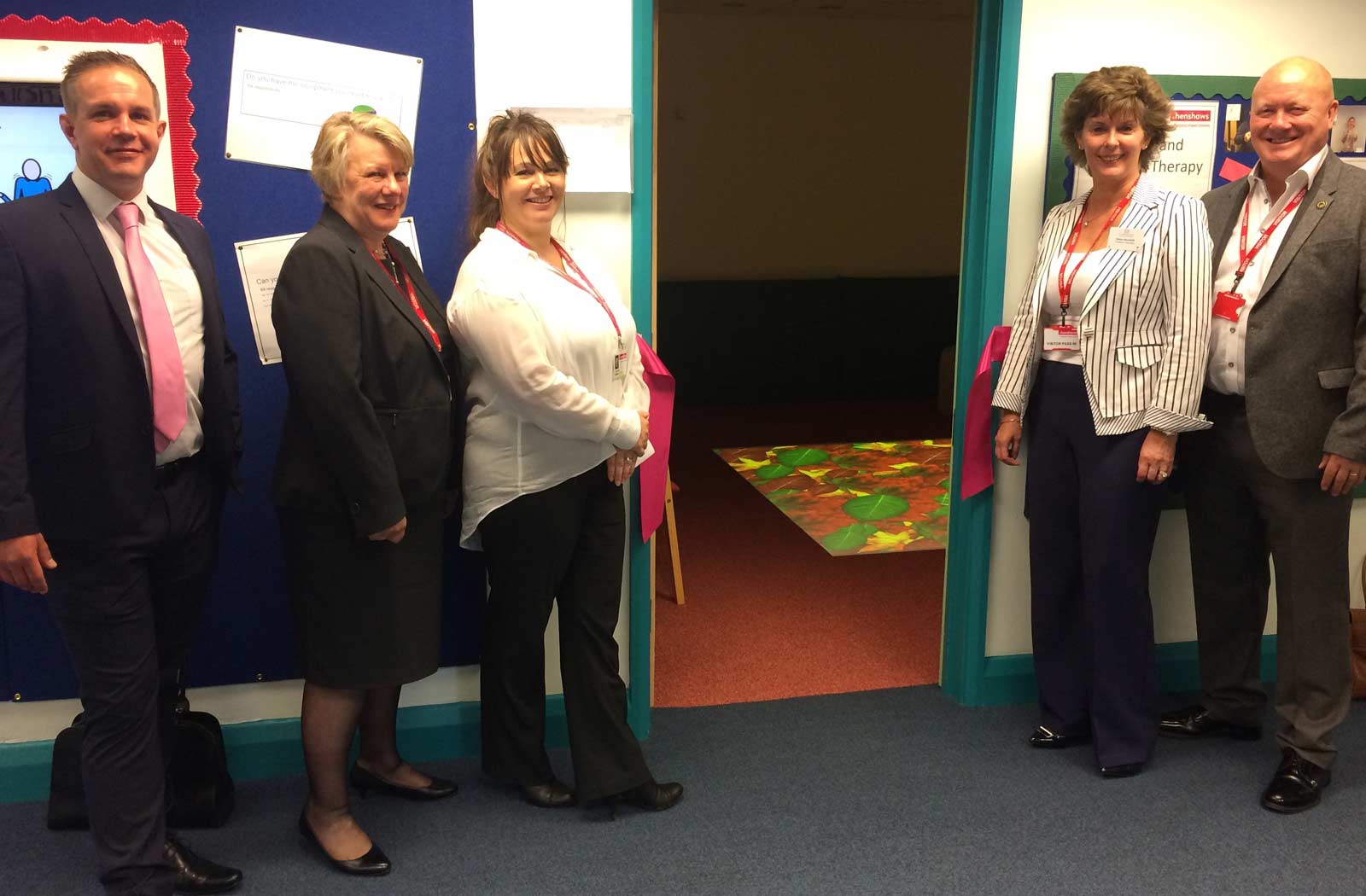 Cutting the ribbon to open the new sensory room at Henshaws Specialist College. Left to right: Chris Brewis (4Life Wealth Management), Sue McGregor, (4Life Wealth Management), Angela North (Henshaws Specialist College Principal), Elaine Hinchliffe (St James’s Place Foundation) and Andy Hinchliffe (St James’s Place Foundation)