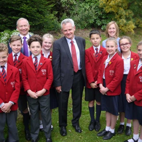 pupils from Belmont Grosvenor School with, from left to right, Chairman of the Governors Gordon Milne, Dr Keith Brownlee and Jane Merriman, Headteacher at Belmont Grosvenor School.