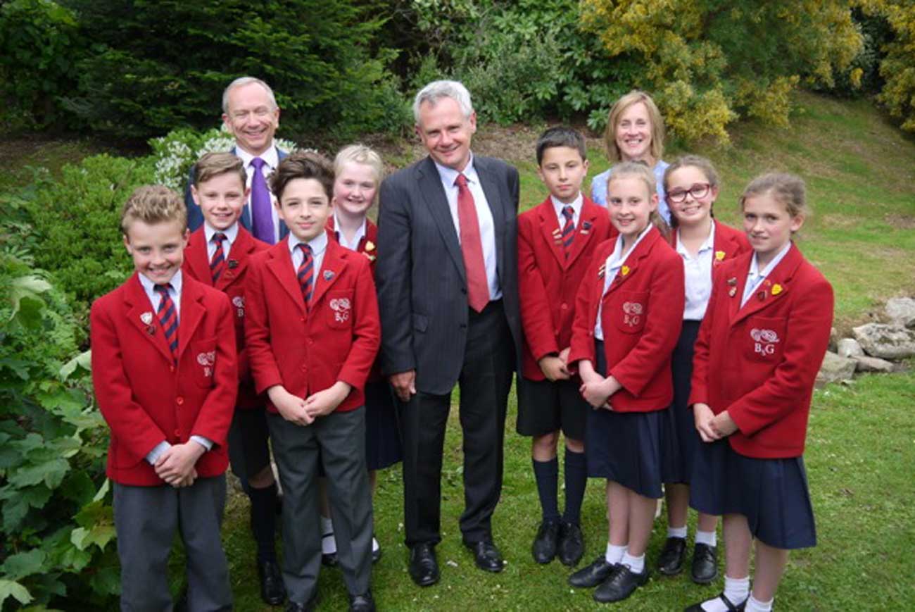 pupils from Belmont Grosvenor School with, from left to right, Chairman of the Governors Gordon Milne, Dr Keith Brownlee and Jane Merriman, Headteacher at Belmont Grosvenor School.