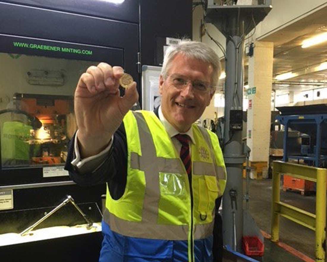Andrew Jones mints the billionth new pound coin