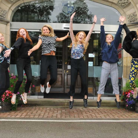 Harrogate-Ladies'-College-pupils-jumping-for-joy