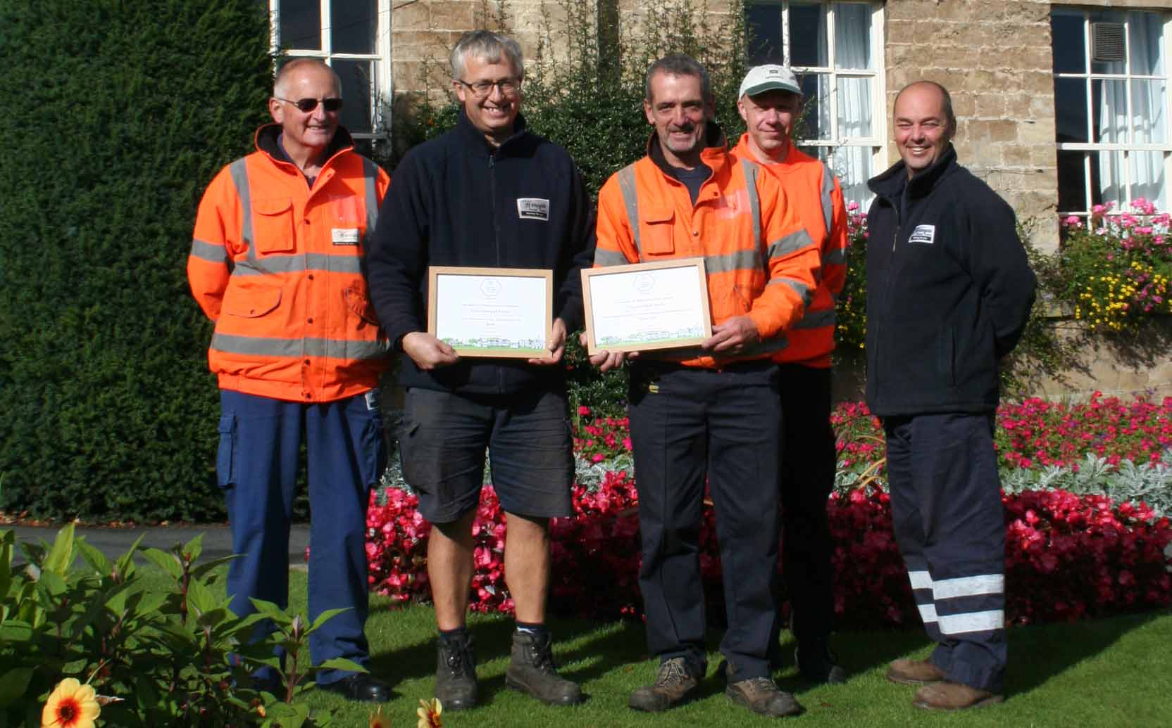 Harrogate Borough Council parks team members Martin Spence, James Howitt, Keith Whincup, David Todd, Andrew Harrison celebrate Knaresborough Castle and Knaresborough House’s success in the Yorkshire in Bloom awards