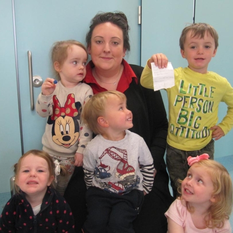 Some of the Tiny Teapots children with childcare practitioner Monique Towler on the site of the discovery
