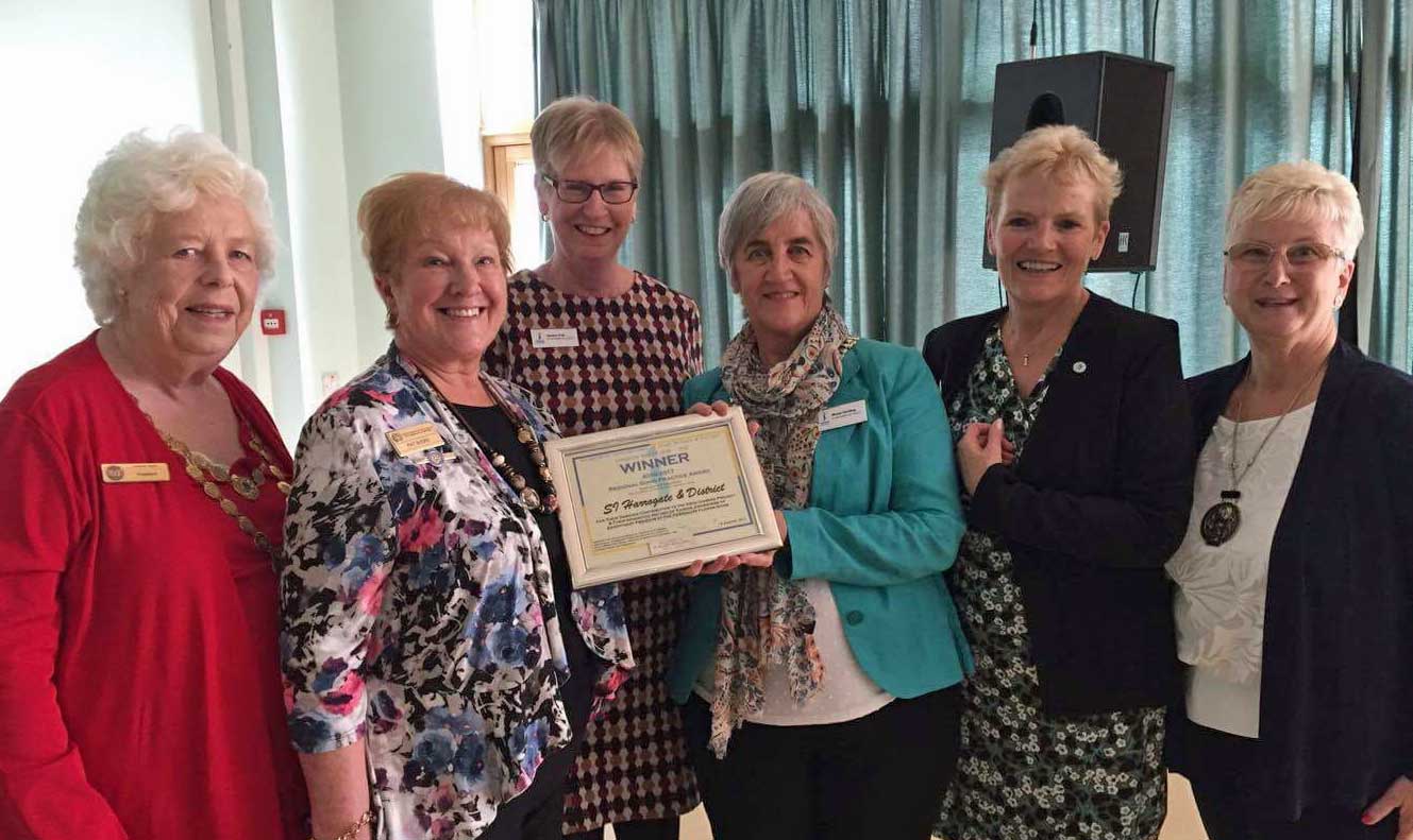 SI Harrogate & District: immediate Past President Pat Shore, Sandra Frier, President Nicola Harding, Val Hills With far left Yorkshire President Jennie Levick and far right Chris Clark, Yorkshire President Elect