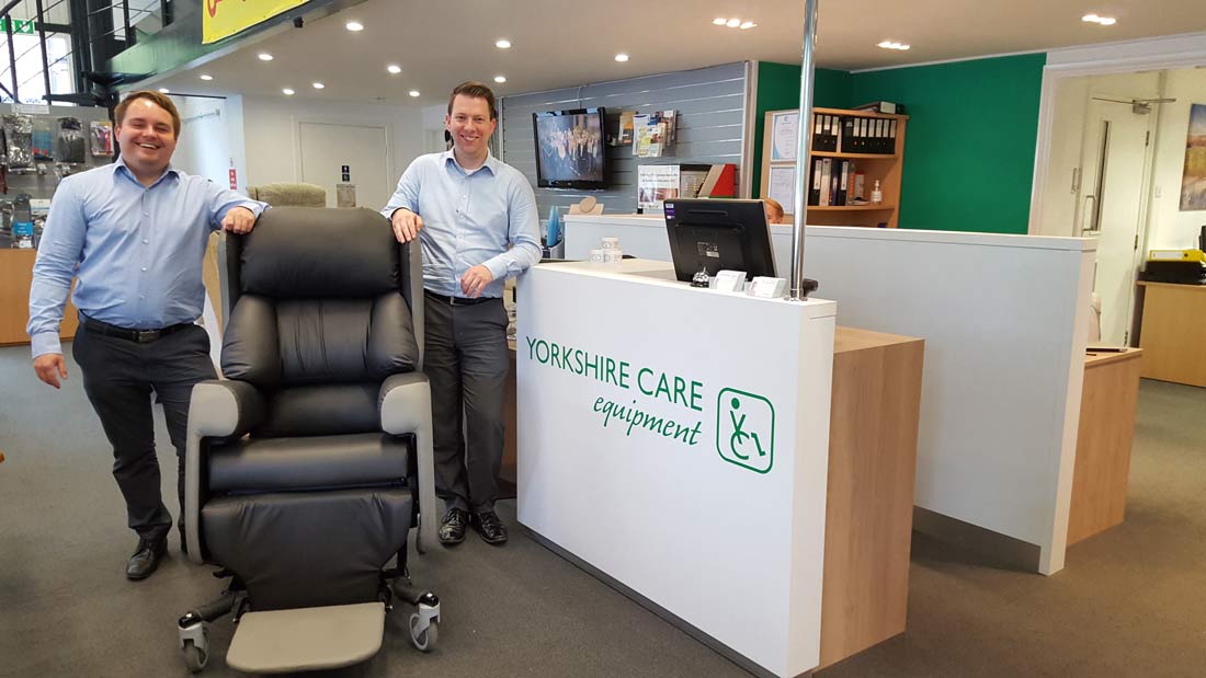 Tom Hulbert (Company CEO) and George Hulbert (Sales Director of Yorkshire Care Equipment) with the new Lento care chair in our Harrogate showroom