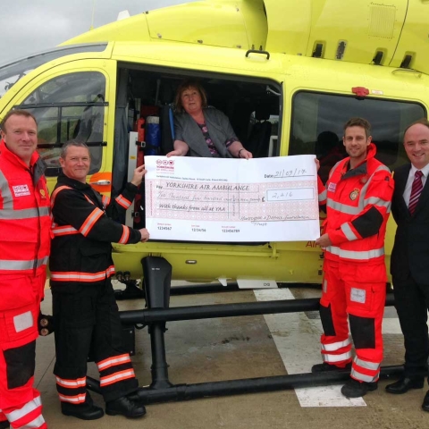 left to right are: Dr Jez Pinnell (YAA Doctor), Darren James (YAA Paramedic), Hillary Levitt (HDFT Trade Union colleagues representative and Unison Branch Secretary), Cpt Harry O’Neil (YAA Pilot).