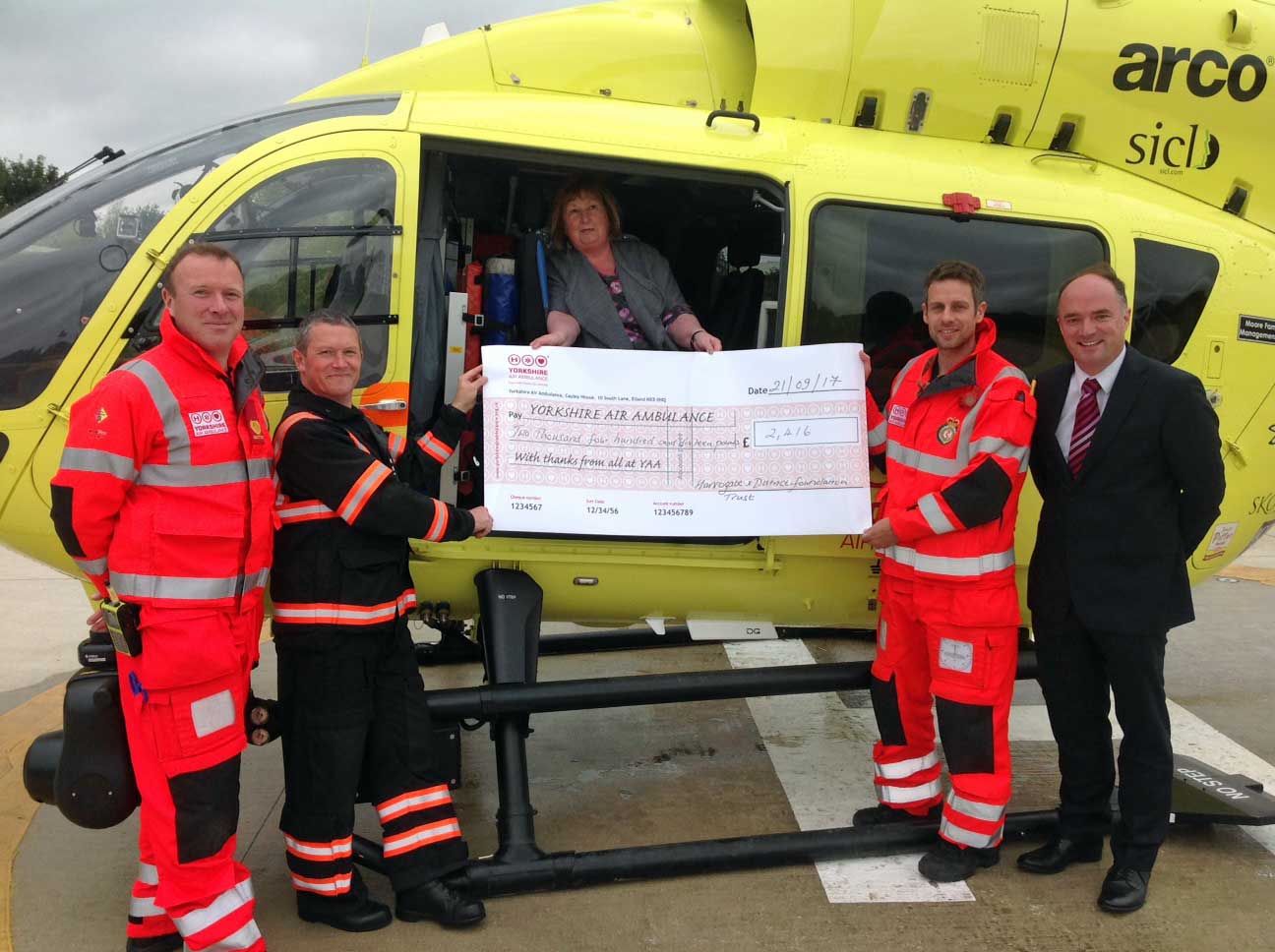 left to right are: Dr Jez Pinnell (YAA Doctor), Darren James (YAA Paramedic), Hillary Levitt (HDFT Trade Union colleagues representative and Unison Branch Secretary), Cpt Harry O’Neil (YAA Pilot).