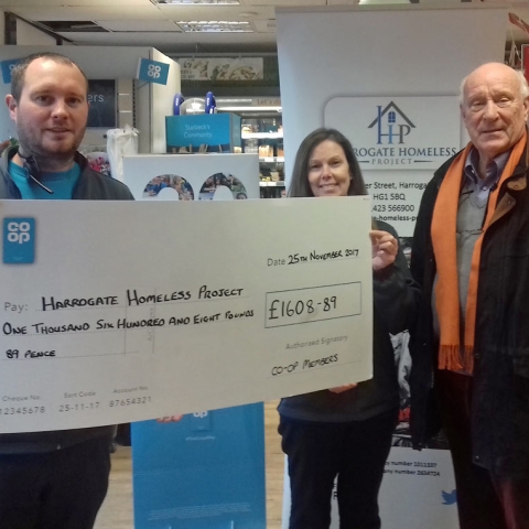 Chris Buckley, Manager of Starbeck Co-op and Luci Archer with John Harris, Chair, Harrogate Homeless Project