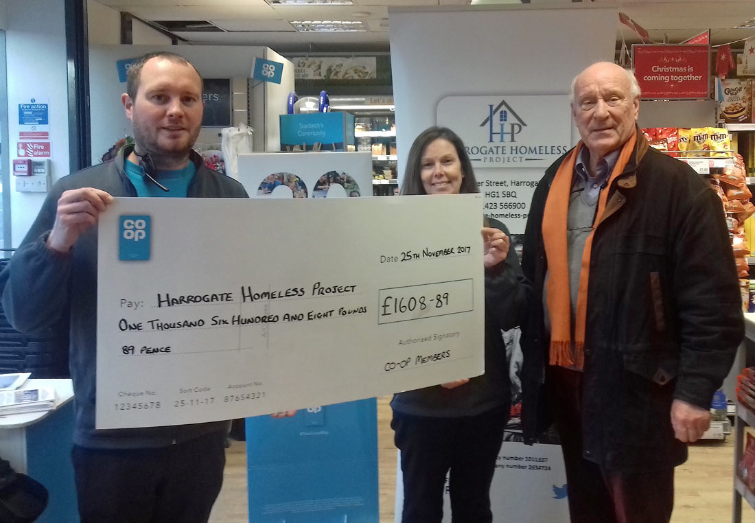 Chris Buckley, Manager of Starbeck Co-op and Luci Archer with John Harris, Chair, Harrogate Homeless Project