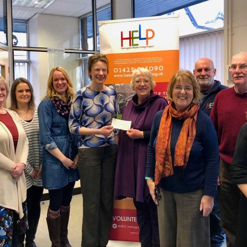 Left to Right: Anna Woollven, Christine Turner, Jennifer Sonley and Lizzie Hughes of HELP, Frances Elliot HELP Project Manager, Jane Burniston (Nidderdale Messiah Chairman), Jill Heyes (Nidderdale Messiah), Andy Storr (HELP), Philip Heyes and Carol Lancaster (Nidderdale Messiah)