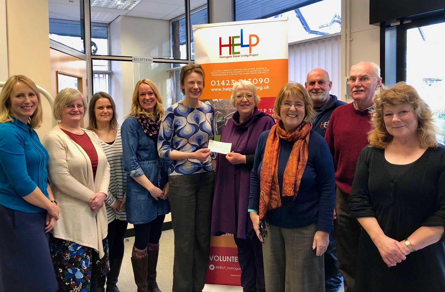 Left to Right: Anna Woollven, Christine Turner, Jennifer Sonley and Lizzie Hughes of HELP, Frances Elliot HELP Project Manager, Jane Burniston (Nidderdale Messiah Chairman), Jill Heyes (Nidderdale Messiah), Andy Storr (HELP), Philip Heyes and Carol Lancaster (Nidderdale Messiah)