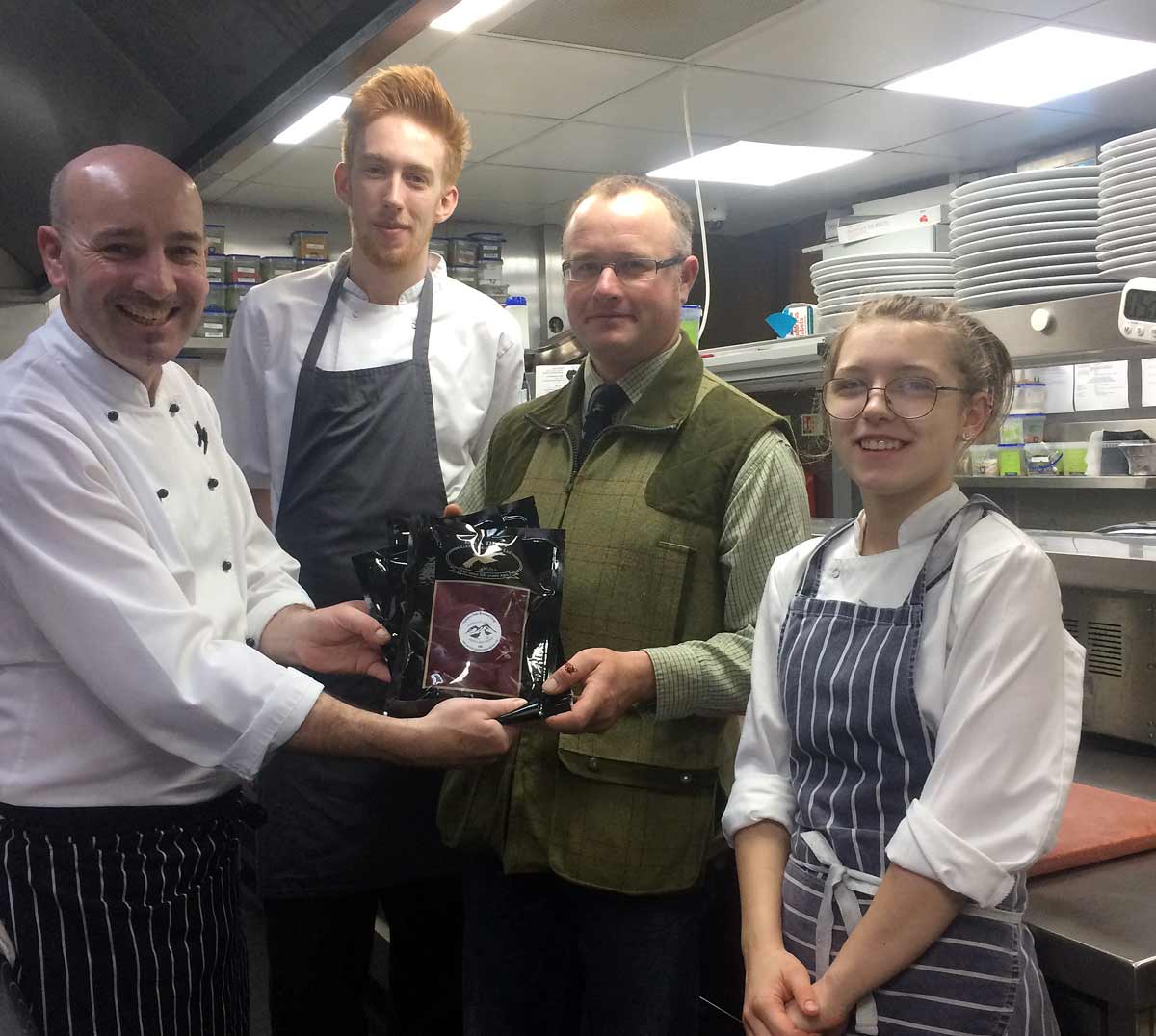 Head keeper, Harvey Wiggins of Grassington Moor supplying grouse to John Rudden of the Grassington House Hotel and Restaurant