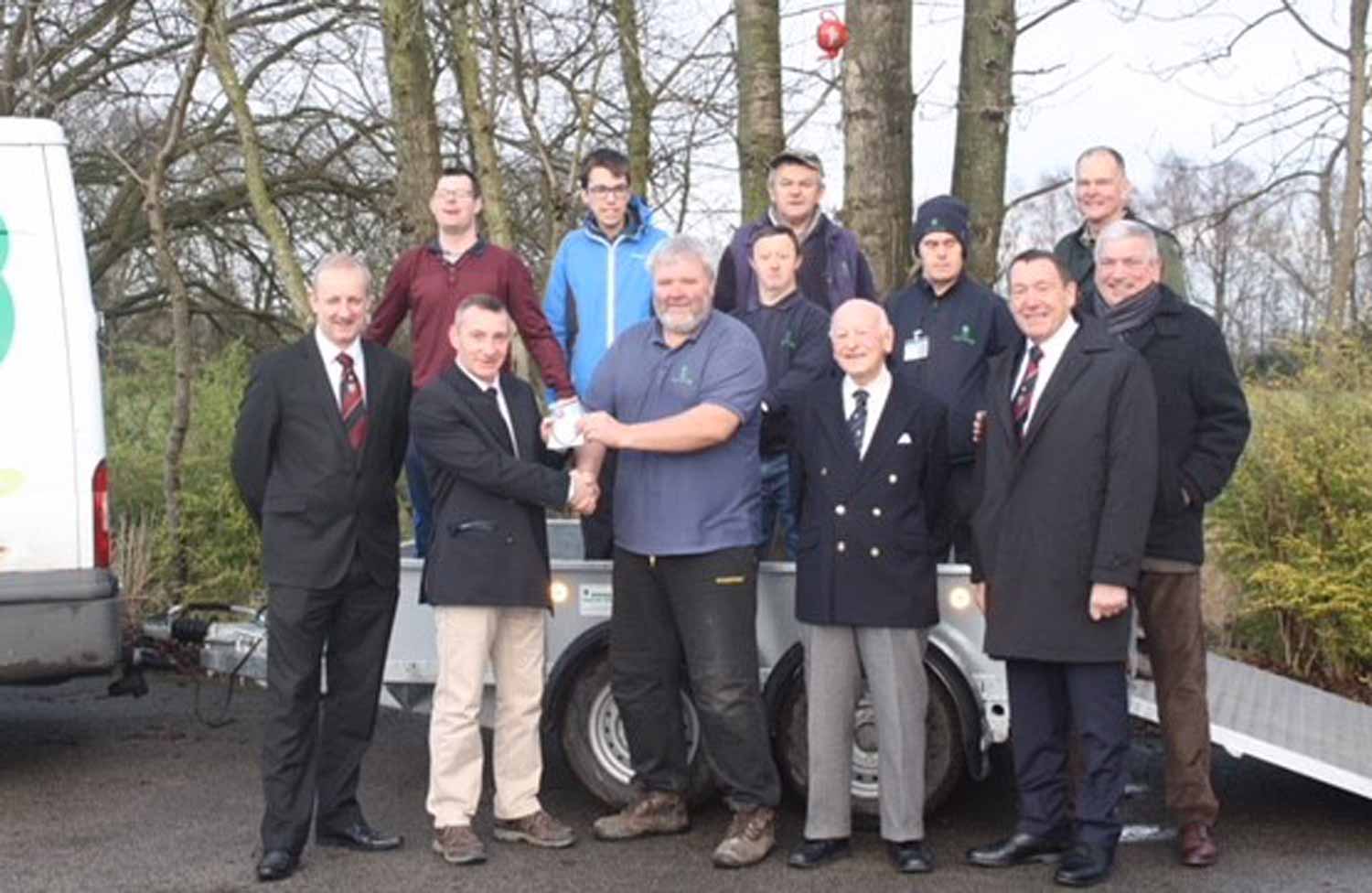 Trailer Cash! Freemasons Sean McPartland, Joe Cocker, Worshipful Master Harrogate & Claro Lodge; Phil Airey Horticap operations manager; Freemasons Tim Wilkinson, Michael Baxter and ohn Birkenshaw, watched on by a group of Horticap student on the trailer behind