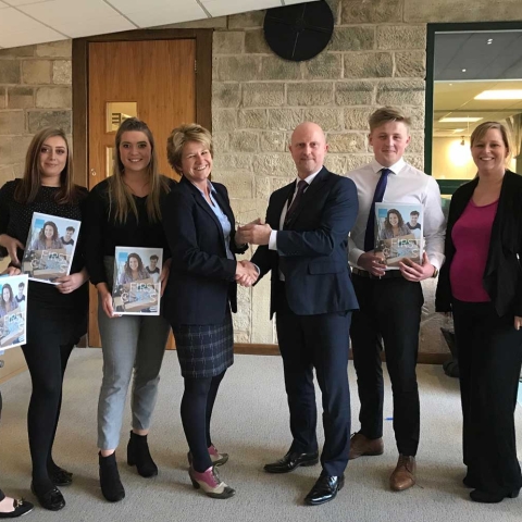 Just the job...Paula Ingham and the Linley & Simpson team of apprentices collect the gold award from Tony Marshall, of the Profound Group