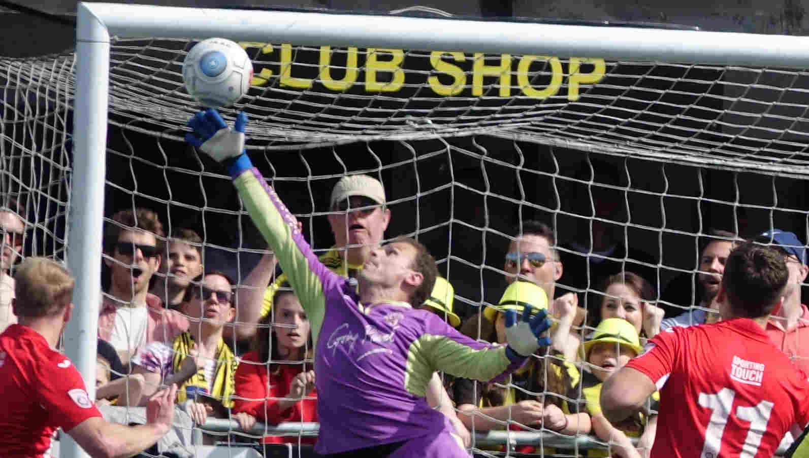 Town celebrated promotion to the National League for the first time in their history,after a 3-0 victory over Brackley