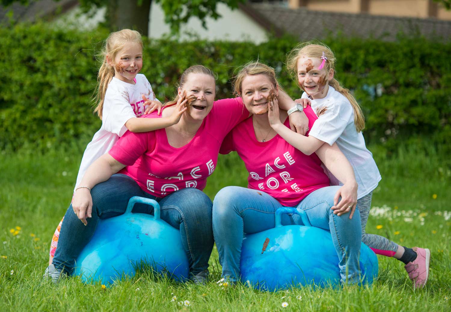 Cancer Research UK Harrogate Fundraising Manager Rachel Speight-McGregor, her sister Sarah Stower, niece Heidi Stower and her best friend Molly-Rose Warren are ready to bounce into action at Pretty Muddy Harrogate