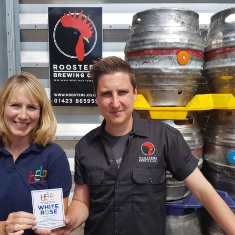Anna Woollven, Project Development Worker at HELP with Tom Fozard, Commercial Manager at Roosters Brewing Co.