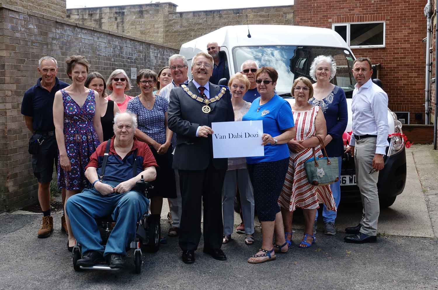 Funders, volunteers, clients and staff gather to officially launch the new Help at Home van