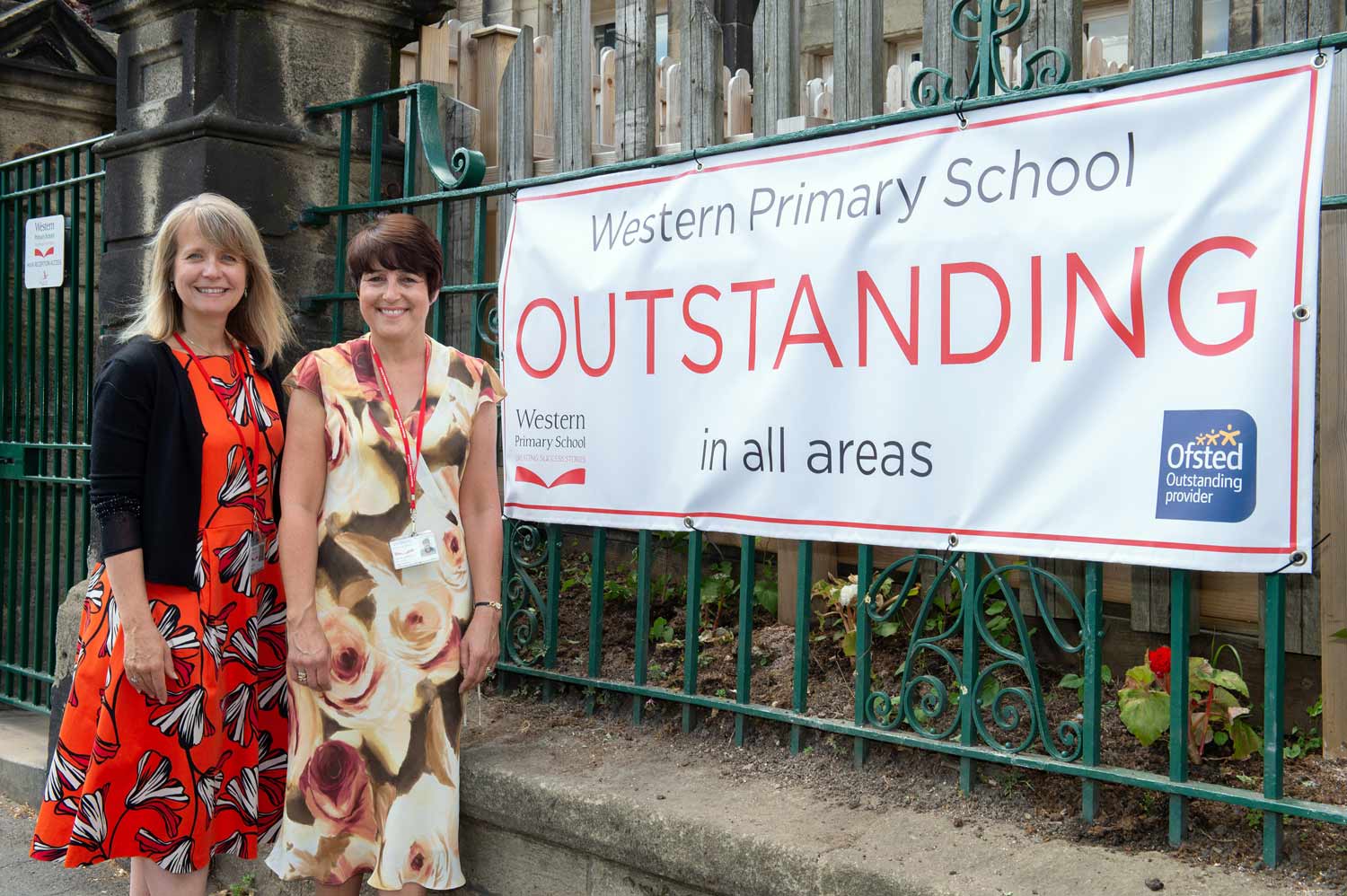 Jayne Sorrell, Chair of Governors and Cheryl Smith, Headteacher standing in front of Western Primary School