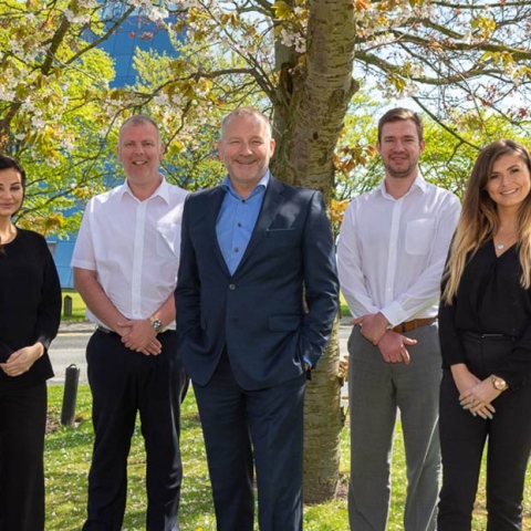 Most successful year to date: Paul Parkinson (centre) with new team members.