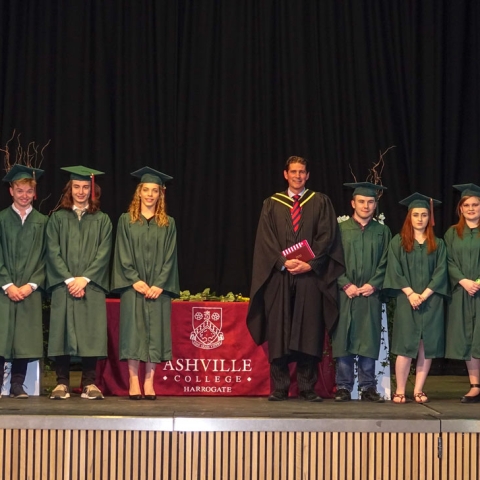 Graduation Day! The American students are joined on stage by Ashville College Headmaster, Richard Marshall