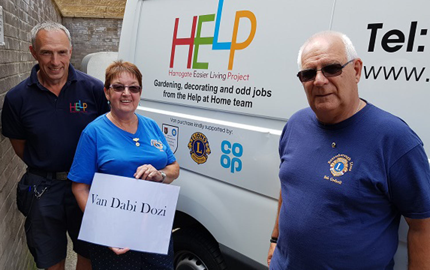 new HELP vehicle, named 'Van Dabi Dozi', which last year's Community Fund contributed to. In the photo are (L-R): HELP volunteer Brian and Knaresborough Lions Pam and Bob