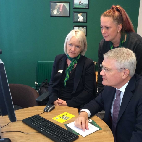 (L – R) Jo Medd and Emma Brierley demonstrate some of the latest security techniques to Andrew Jones MP