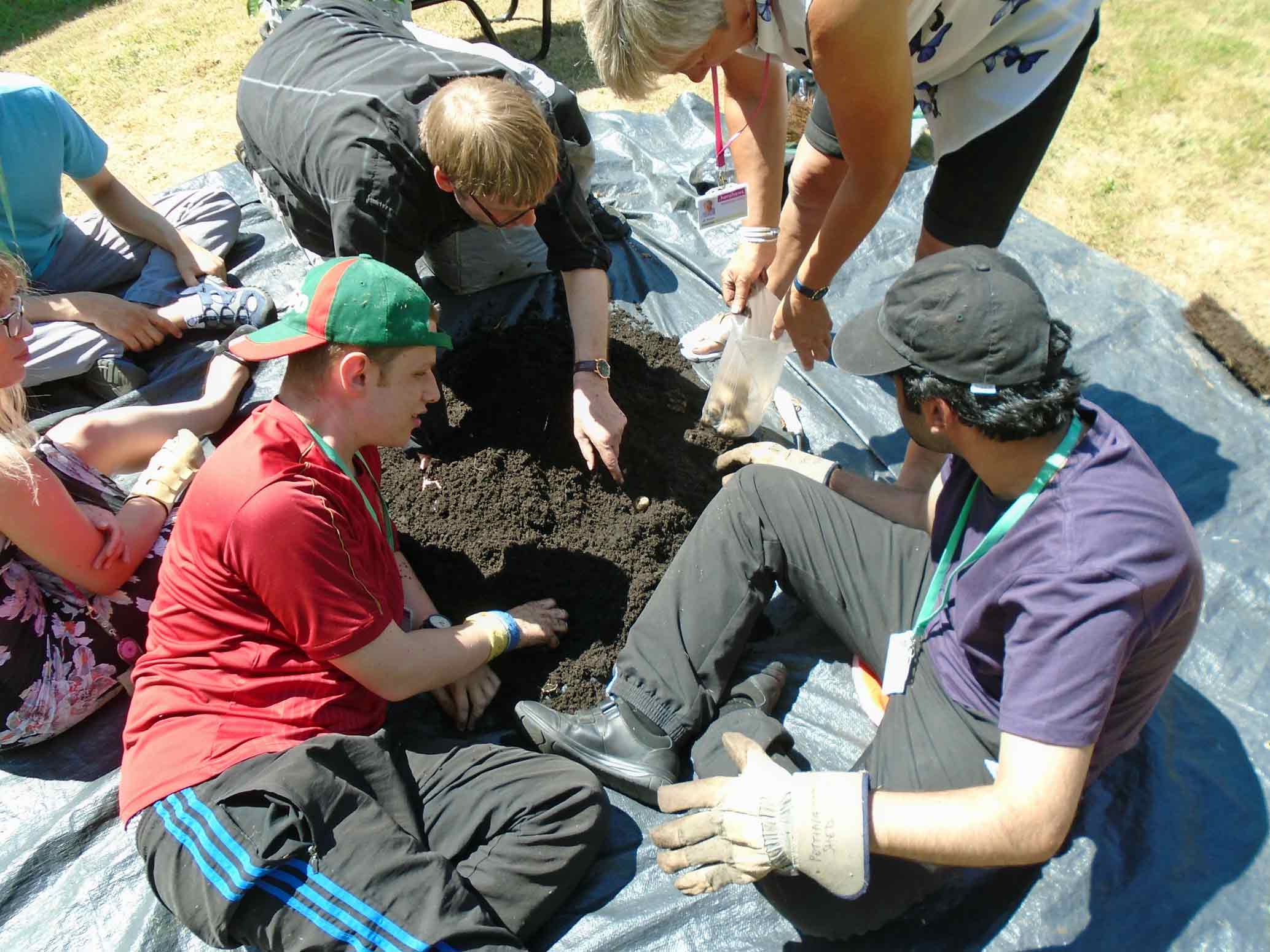 Gathering the potato crop are students George Crouch and Jonnade Ahmed with some of Henshaws Duke of Edinburgh staff team On their expedition are Student Amy Dearlove with Enabler Anton Watson