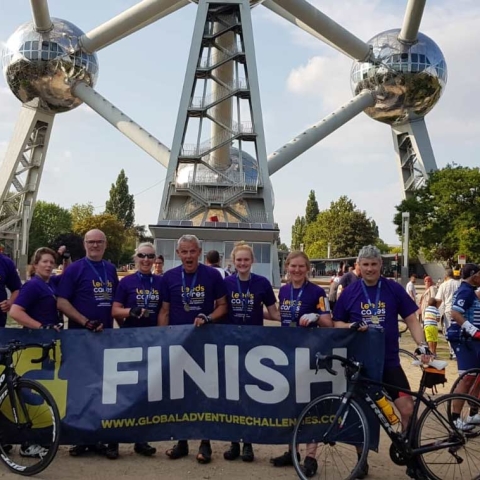 Pedal team powers to £2,000 for cancer charity