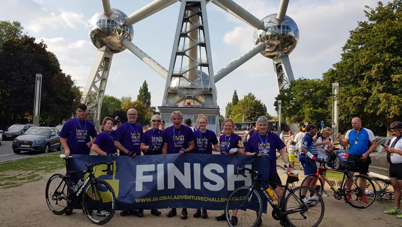 Pedal team powers to £2,000 for cancer charity