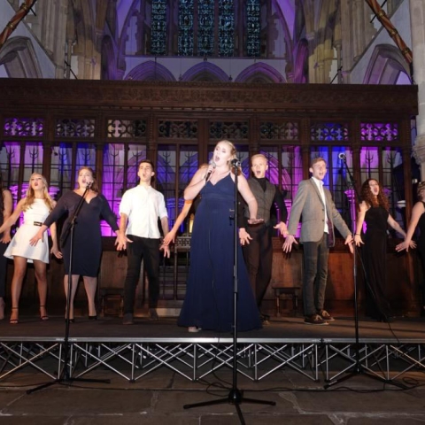 Raising Funds And Raising the Roof! Niamh Boyle, front and centre, sings the opening number at the “Songs from the Musicals” concert held in St Wilfrid’s Church