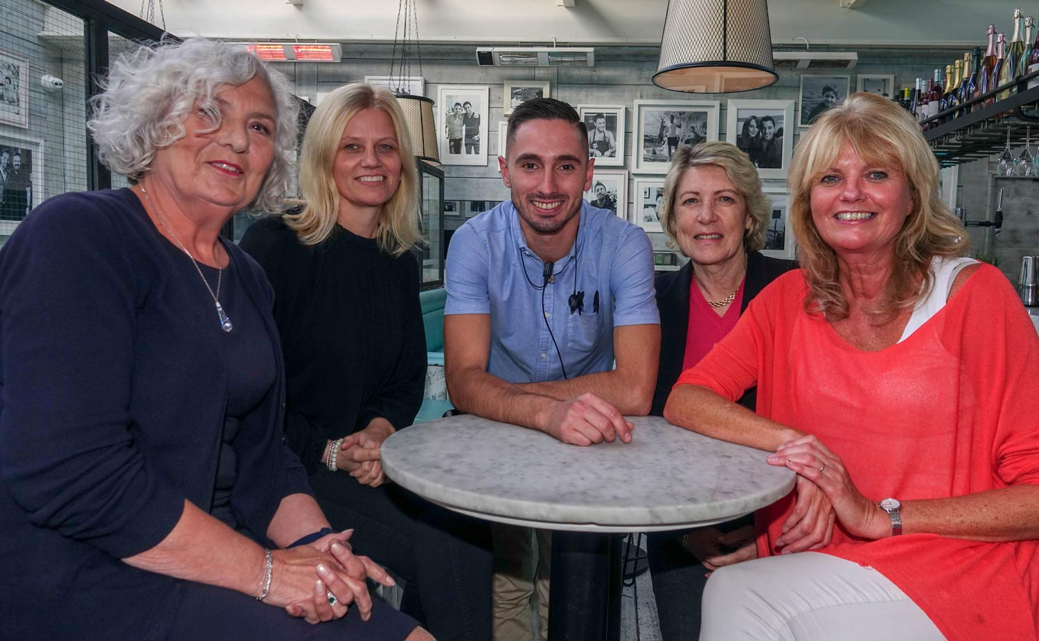 The Show Will Go On! Pictured from left are Jean Williams, fashion show co-organiser; Jayne Winn, owner of Sheer Bliss Lingerie; Davide Scioni from Gino D’Acampo’s; Christine Armstrong, cancer patient and fundraiser; and Julie Crossman, Lead Complementary Therapist at the Sir Robert Ogden Macmillan Centre and Strutting For Cancer Show co-organiser