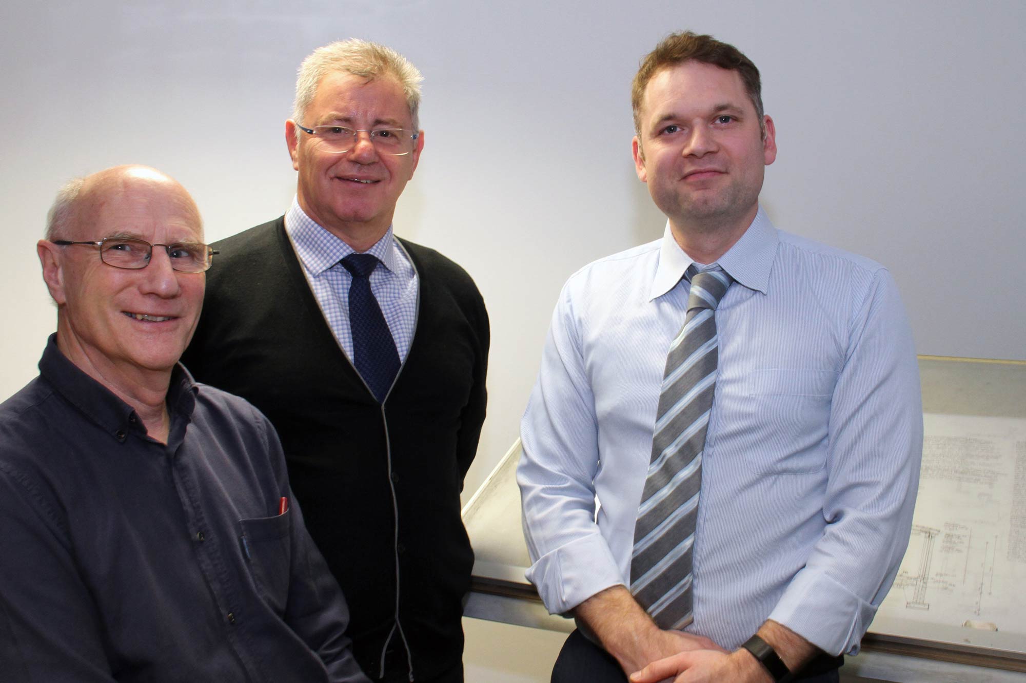 Councillor Graham Swift, cabinet member for resources, enterprise and economic development, (centre) with Peter (left) and Matthew (right) from PMK Design Associates