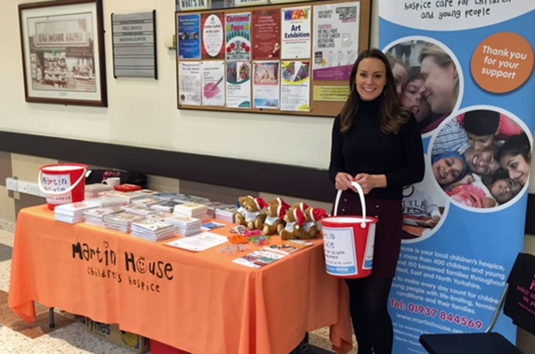 X-mas factor ... Emily Wilkinson staffs the Martin House charity Christmas card stall