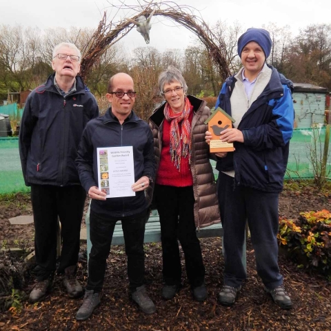 Members of Open Country receive their certificate and plaque from Pamela Millen, secretary of the Harrogate District Biodiversity Action Group