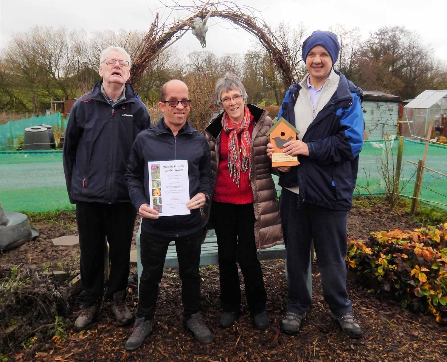 Members of Open Country receive their certificate and plaque from Pamela Millen, secretary of the Harrogate District Biodiversity Action Group