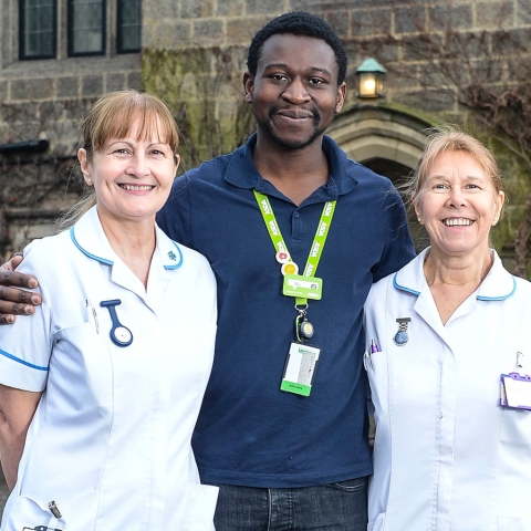 Asda's Phil Ngoma with two nurses from St Michael's hospice