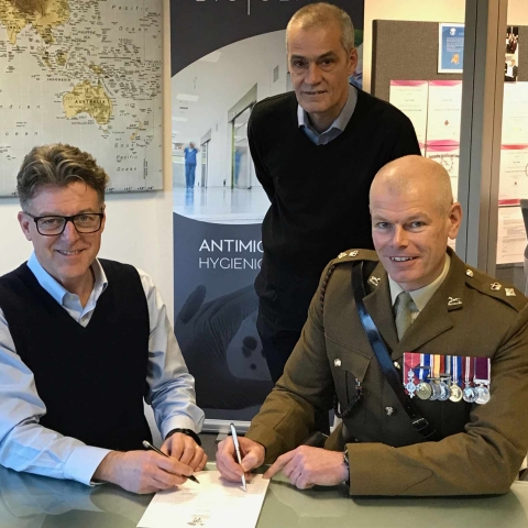 left to right are BioClad managing director Lindsay McKenzie, BioClad supply chain co-ordinator Paul Ellis and Lieutenant Colonel Richard Hall
