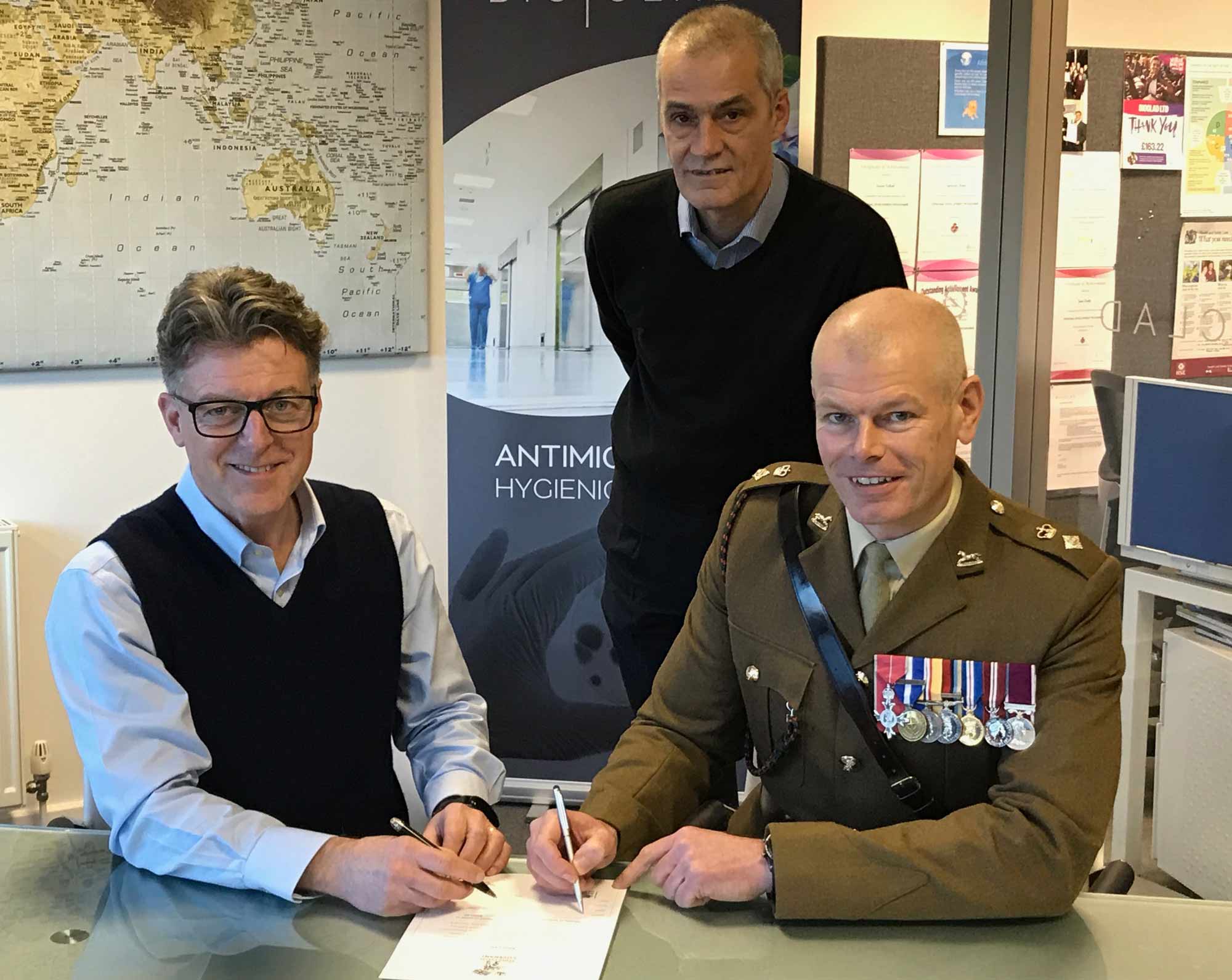 left to right are BioClad managing director Lindsay McKenzie, BioClad supply chain co-ordinator Paul Ellis and Lieutenant Colonel Richard Hall