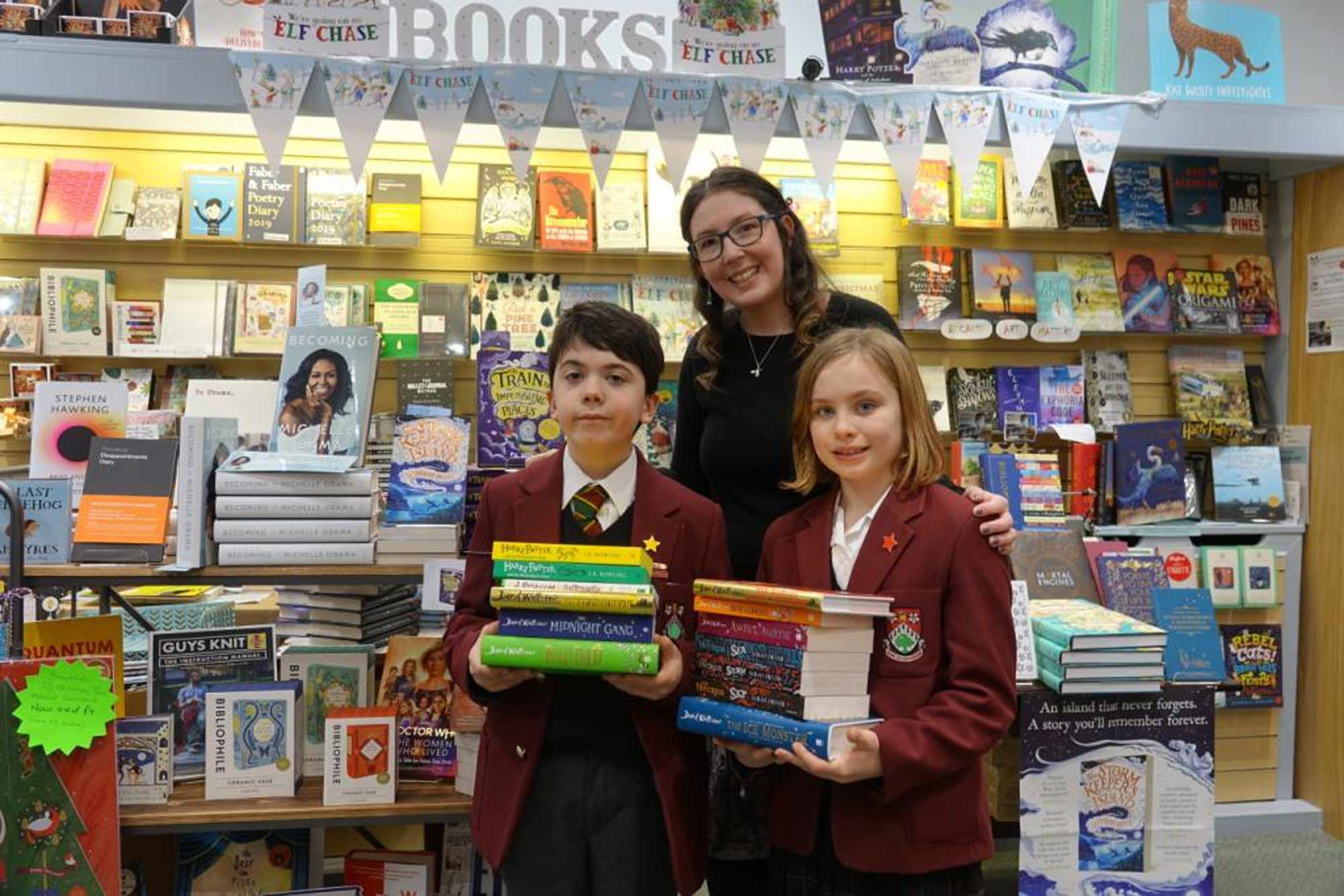 Brought to Book! Ashville pupils Isabella and Elliot with Imagined Things Bookshop proprietor, Georgia Duffy