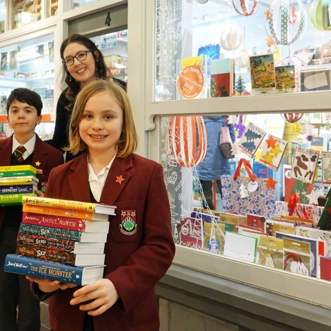 Brought to Book! Ashville pupils Isabella and Elliot with Imagined Things Bookshop proprietor, Georgia Duffy