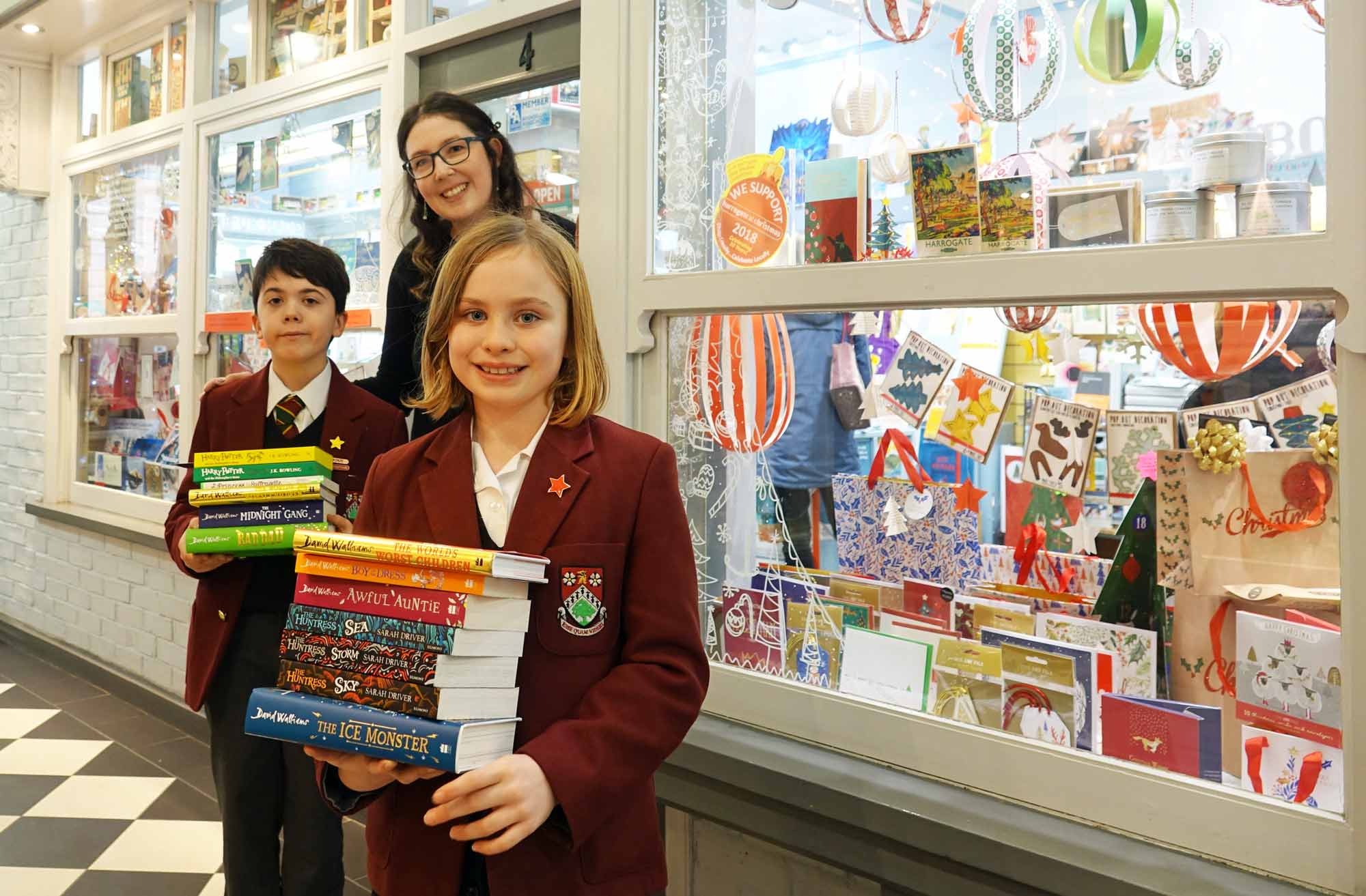 Brought to Book! Ashville pupils Isabella and Elliot with Imagined Things Bookshop proprietor, Georgia Duffy