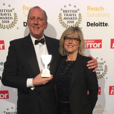 Managing Director, Peter Cookson, along with his wife and fellow Director, Libby Cookson, accepting the award at The Battersea Evolution in London