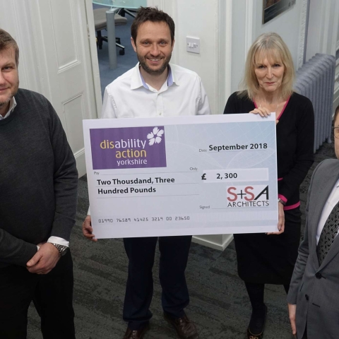 Pedal Power! Pictured from left are Jon Brookman and Joel Smith, both from S+SA Architects, and Disability Action Yorkshire’s chief executive, Jackie Snape and operations manager David Ashton-Jones