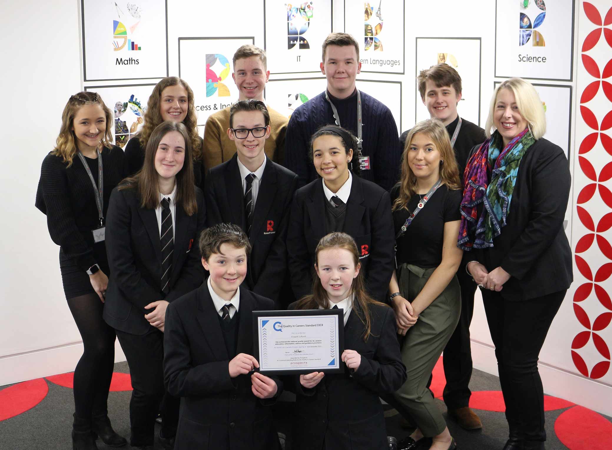 Associate assistant headteacher Sarah Daly, right, with students who met the assessor when he visited Rossett and told him of their experience of careers advice at school