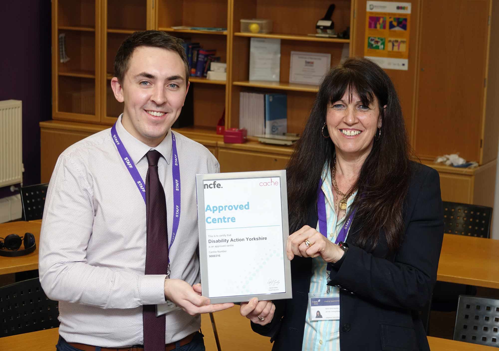 Training Excellence! Disability Action Senior Tutor Tom Brown and Training Operations Manager Denise Baynton with the award from NCFE