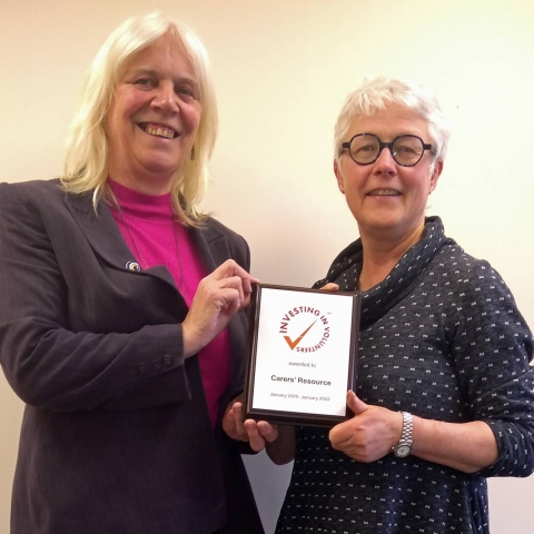 chief executive Chris Whiley, left, and chair of trustees Liz Jones with the organisation’s Investing in Volunteers certificate