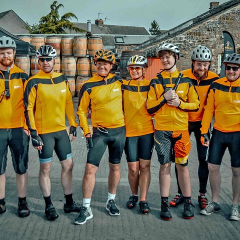 Interior design team gets on its bike for homelessness